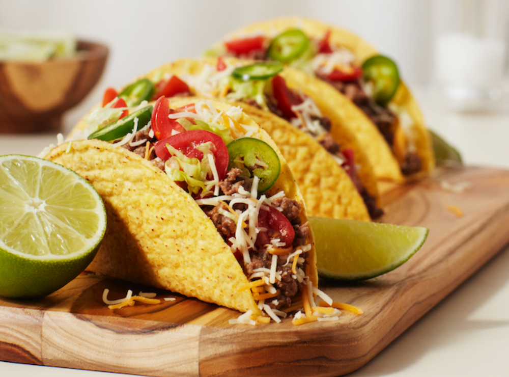 Old El Paso beef tacos on a cutting board